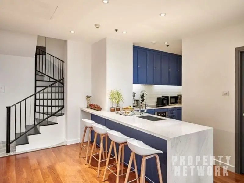 2-bed 2-bath 108 sqm duplex condo in Sathorn for sale at 19.25M THB. Open view, prime location, near BTS, well-maintained building with top amenities.