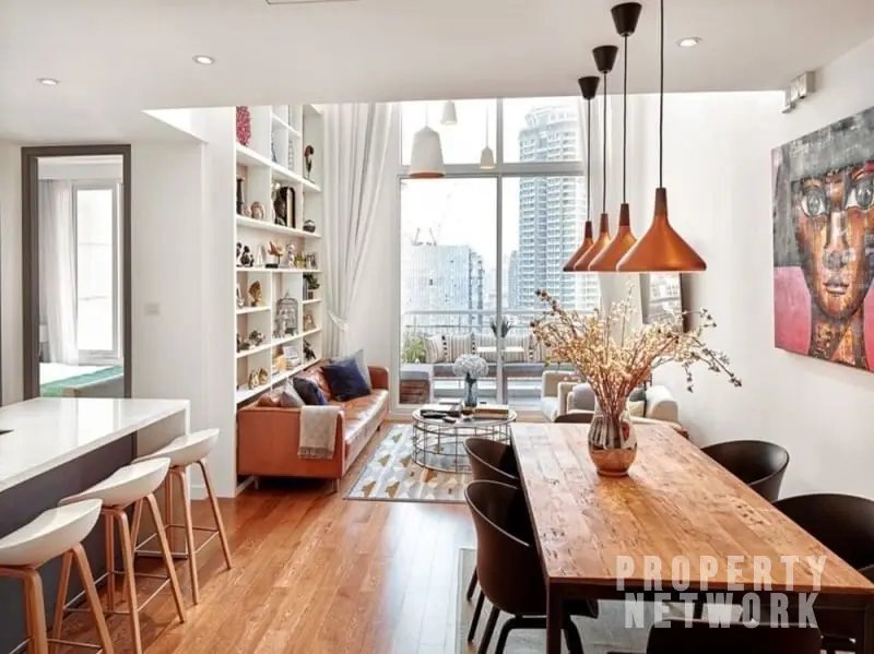 2-bed 2-bath 108 sqm duplex condo in Sathorn for sale at 19.25M THB. Open view, prime location, near BTS, well-maintained building with top amenities.