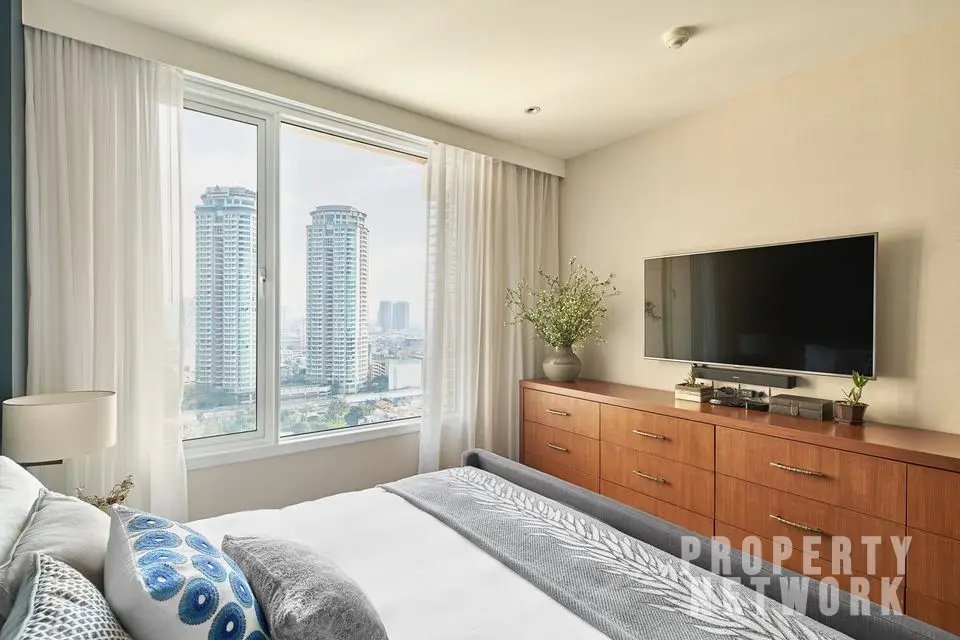 2-bed 2-bath 108 sqm duplex condo in Sathorn for sale at 19.25M THB. Open view, prime location, near BTS, well-maintained building with top amenities.
