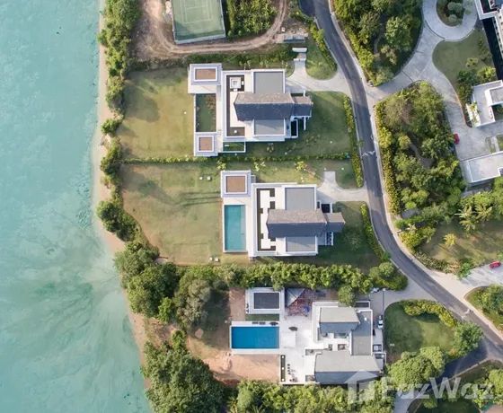 Luxury 6-bed, 6-bath beachfront villa at The Cape Residences, Phuket. 3,920 sqm of elegance with infinity pool, private beach & world-class amenities. ฿506M.