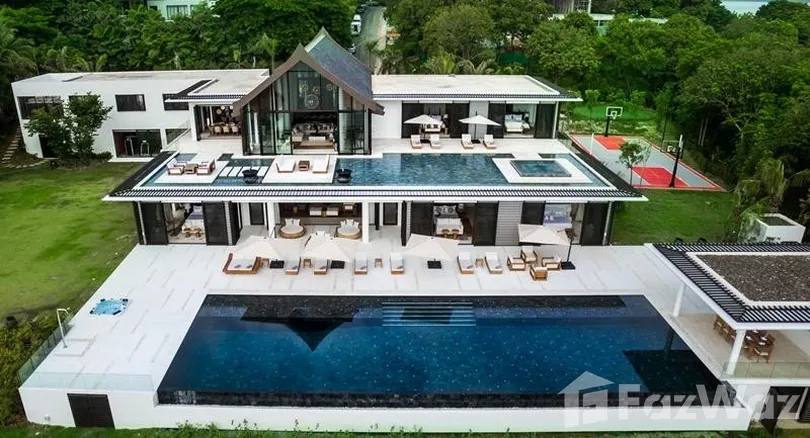 Luxury 6-bed, 6-bath beachfront villa at The Cape Residences, Phuket. 3,920 sqm of elegance with infinity pool, private beach & world-class amenities. ฿506M.