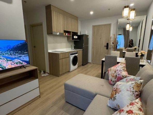 Luxury 2-bedroom, 1-bathroom condo at Life Rama 4-Asoke, 48 sqm, fully furnished with modern decor, high-end appliances, and excellent facilities near MRT Queen Sirikit.