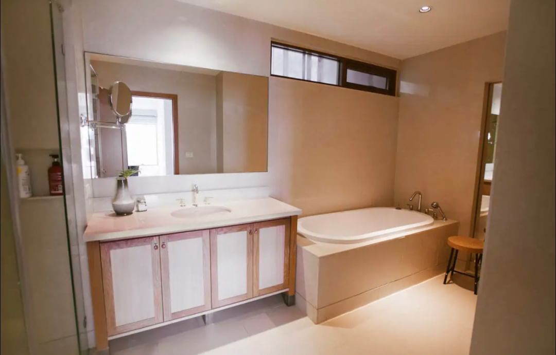 Luxury 2-bed, 2-bath condo at The Emporio Place, 139 sqm, fully furnished. Prime Sukhumvit location near BTS Phrom Phong. Rent 98,000 THB/month.