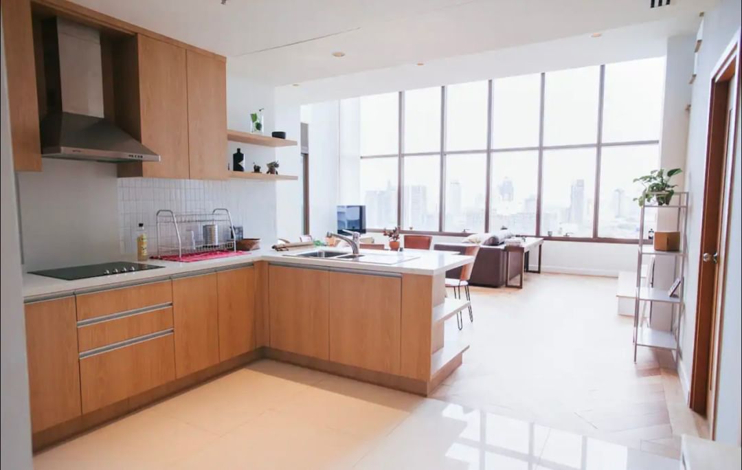 Luxury 2-bed, 2-bath condo at The Emporio Place, 139 sqm, fully furnished. Prime Sukhumvit location near BTS Phrom Phong. Rent 98,000 THB/month.