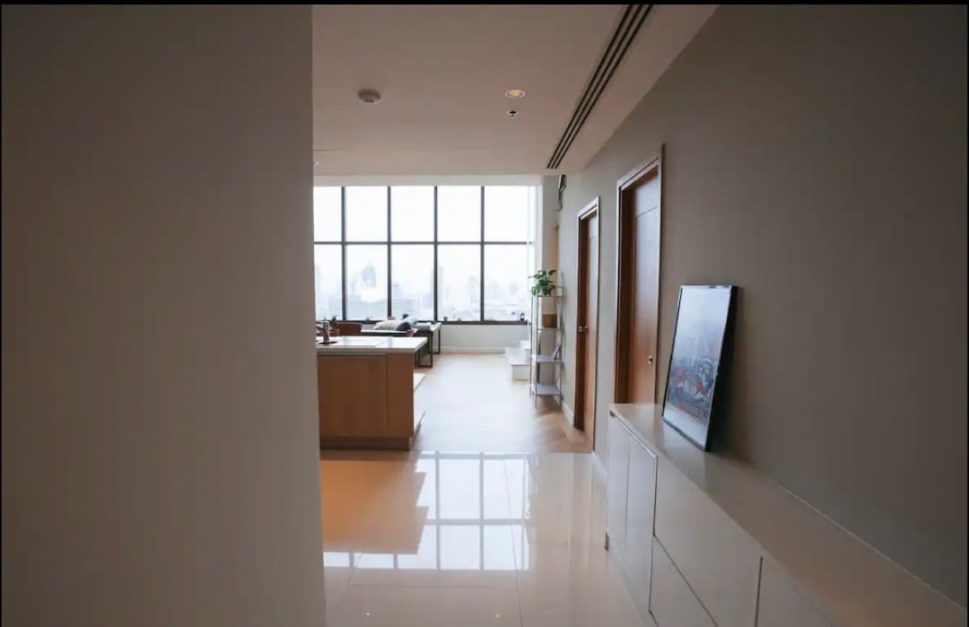 Luxury 2-bed, 2-bath condo at The Emporio Place, 139 sqm, fully furnished. Prime Sukhumvit location near BTS Phrom Phong. Rent 98,000 THB/month.