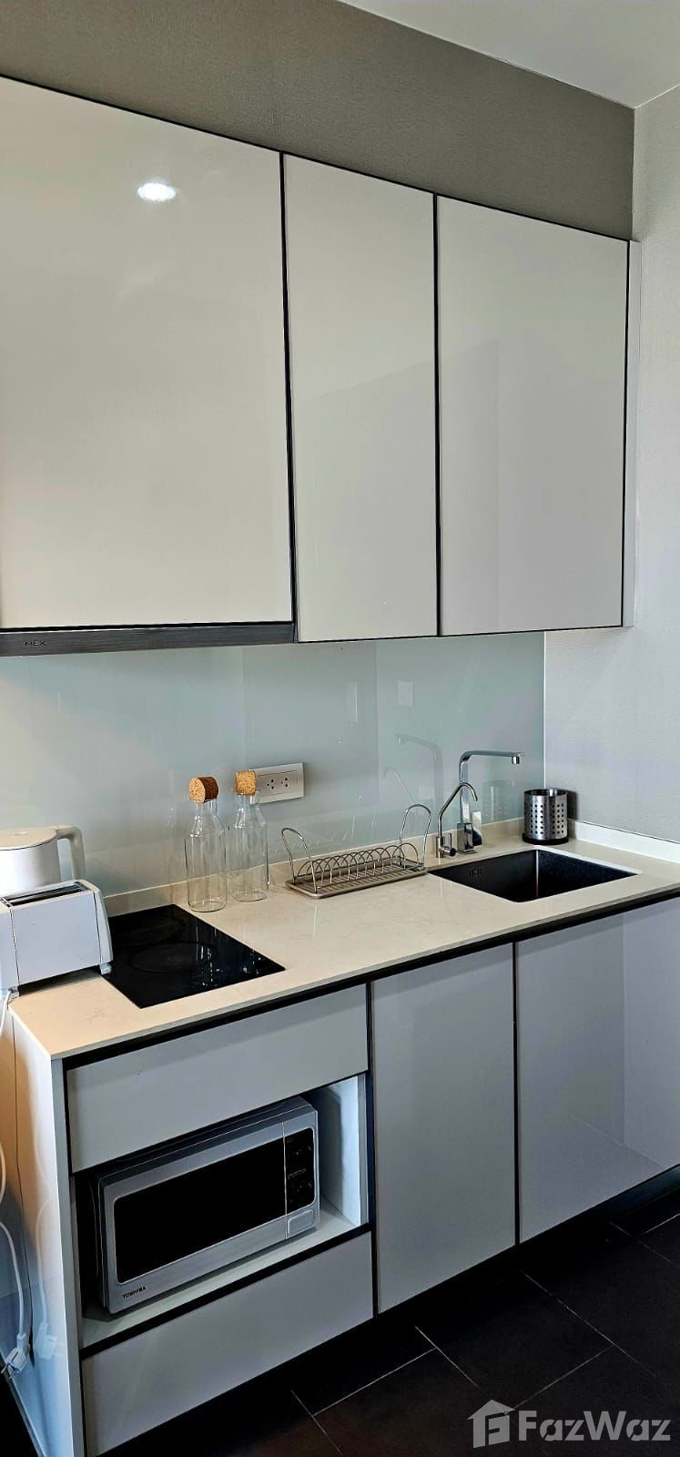 Modern 1-bed, 1-bath, 31 sqm condo at C Ekkamai for sale at ฿4.4M. Prime Ekkamai location with top-tier amenities, pool, gym, and easy access to BTS.