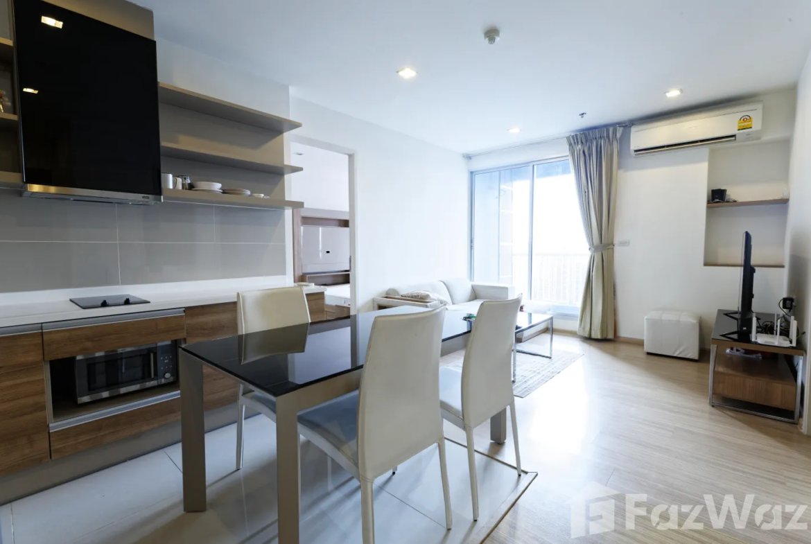 "2 Bedrooms, 2 Bathrooms, 63 sqm at Rhythm Sukhumvit 50. Spacious condo for sale at ฿9,900,000. Perfect for city living near On Nut BTS. Contact us today!"