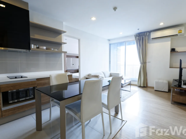 "2 Bedrooms, 2 Bathrooms, 63 sqm at Rhythm Sukhumvit 50. Spacious condo for sale at ฿9,900,000. Perfect for city living near On Nut BTS. Contact us today!"