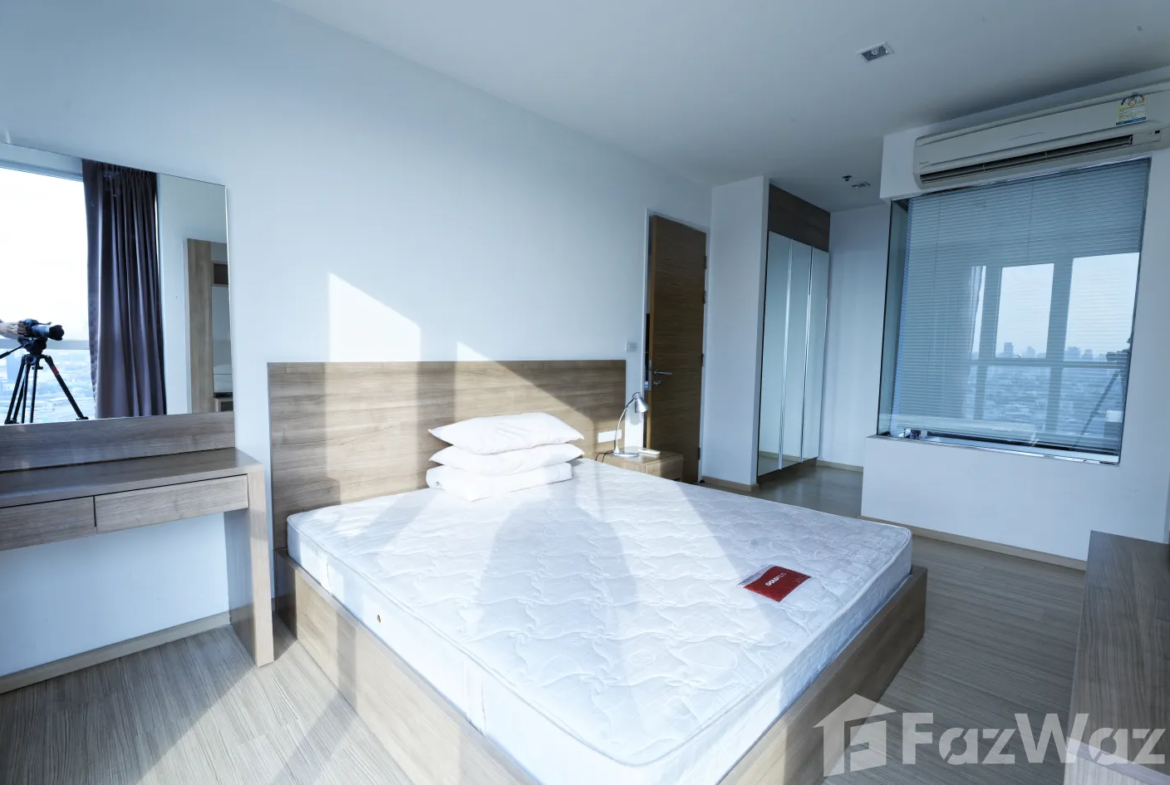 "2 Bedrooms, 2 Bathrooms, 63 sqm at Rhythm Sukhumvit 50. Spacious condo for sale at ฿9,900,000. Perfect for city living near On Nut BTS. Contact us today!"