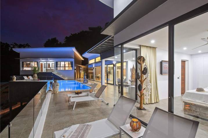 Luxury 4-bed 4.5-bath 882 SQM Villa Coco Koh Samui for sale. Private infinity pool, ocean views, top location in Chaweng Noi. Price 39.75M THB. Contact us now!