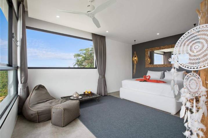 Luxury 4-bed 4.5-bath 882 SQM Villa Coco Koh Samui for sale. Private infinity pool, ocean views, top location in Chaweng Noi. Price 39.75M THB. Contact us now!