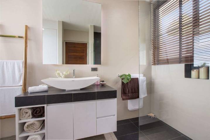 Luxury 4-bed 4.5-bath 882 SQM Villa Coco Koh Samui for sale. Private infinity pool, ocean views, top location in Chaweng Noi. Price 39.75M THB. Contact us now!