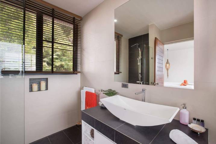 Luxury 4-bed 4.5-bath 882 SQM Villa Coco Koh Samui for sale. Private infinity pool, ocean views, top location in Chaweng Noi. Price 39.75M THB. Contact us now!