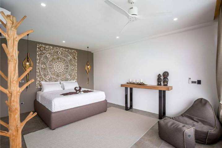 Luxury 4-bed 4.5-bath 882 SQM Villa Coco Koh Samui for sale. Private infinity pool, ocean views, top location in Chaweng Noi. Price 39.75M THB. Contact us now!
