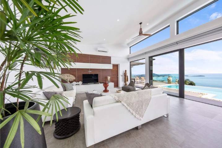 Luxury 4-bed 4.5-bath 882 SQM Villa Coco Koh Samui for sale. Private infinity pool, ocean views, top location in Chaweng Noi. Price 39.75M THB. Contact us now!