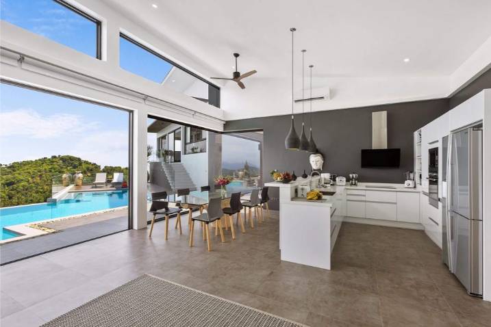 Luxury 4-bed 4.5-bath 882 SQM Villa Coco Koh Samui for sale. Private infinity pool, ocean views, top location in Chaweng Noi. Price 39.75M THB. Contact us now!