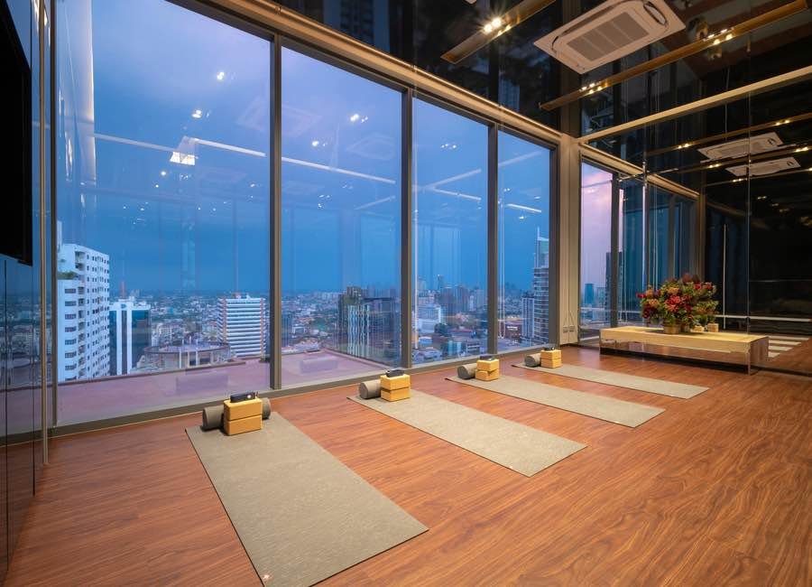 Stylish living room of luxury 2-bedroom condo at LAVIQ Sukhumvit 57 with European furniture and large windows near BTS Thong Lor