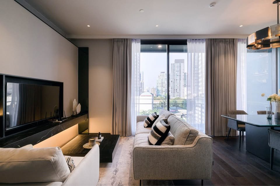 Stylish living room of luxury 2-bedroom condo at LAVIQ Sukhumvit 57 with European furniture and large windows near BTS Thong Lor