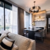 Stylish living room of luxury 2-bedroom condo at LAVIQ Sukhumvit 57 with European furniture and large windows near BTS Thong Lor