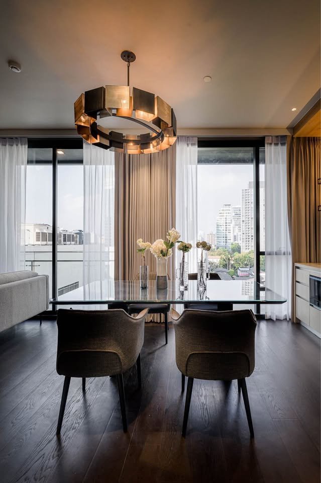 Stylish living room of luxury 2-bedroom condo at LAVIQ Sukhumvit 57 with European furniture and large windows near BTS Thong Lor
