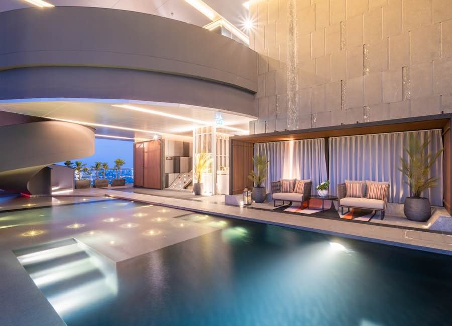 Stylish living room of luxury 2-bedroom condo at LAVIQ Sukhumvit 57 with European furniture and large windows near BTS Thong Lor