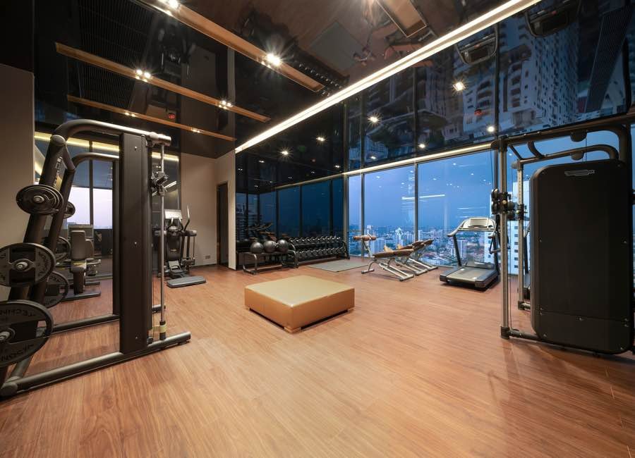 Stylish living room of luxury 2-bedroom condo at LAVIQ Sukhumvit 57 with European furniture and large windows near BTS Thong Lor