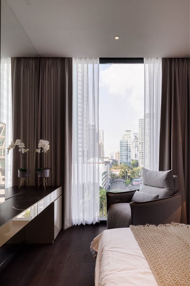 Stylish living room of luxury 2-bedroom condo at LAVIQ Sukhumvit 57 with European furniture and large windows near BTS Thong Lor