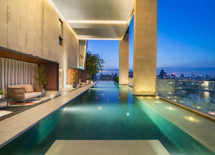Stylish living room of luxury 2-bedroom condo at LAVIQ Sukhumvit 57 with European furniture and large windows near BTS Thong Lor