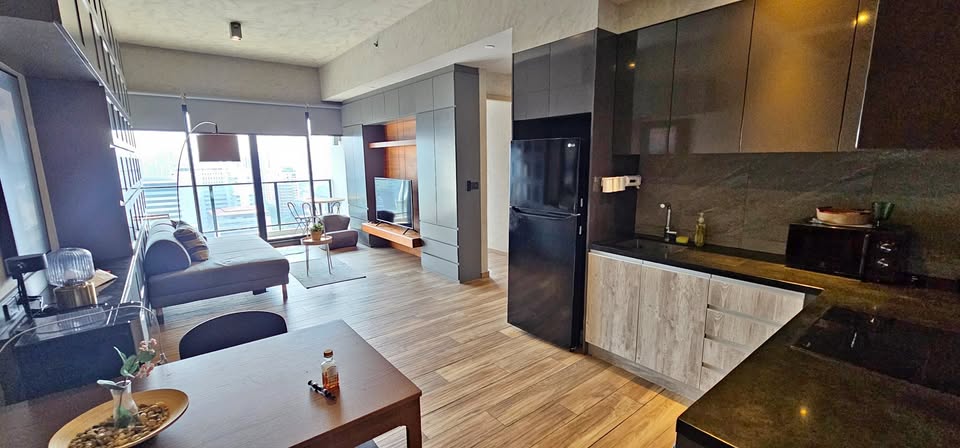 2-Bedroom, 1-Bathroom Condo for Rent at The Lofts Asoke, 75 sqm, ฿65,000/month, Fully Furnished, Near Phetchaburi MRT, Modern Living in Sukhumvit 21, Available Now.