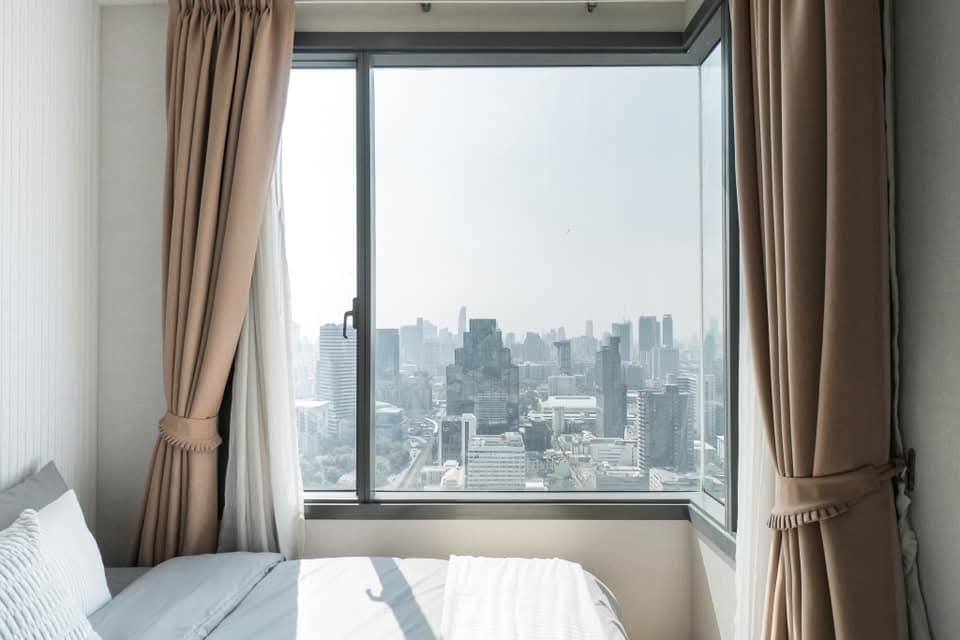 2-bedroom condo at Pyne by Sansiri, 68 sqm, 35th floor, near BTS Ratchathewi. Rent 49,000 THB/month. Fully furnished with pool, gym, and sauna.