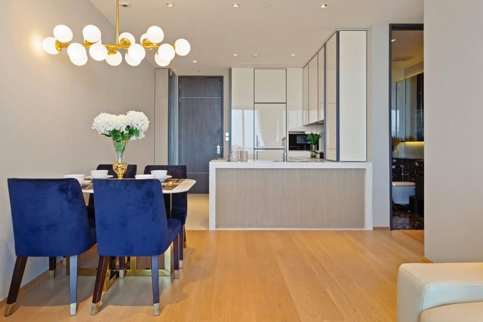 Luxury 2-bedroom condo at BEATNIQ Sukhumvit 32 for sale 21.5M THB. Cheapest unit in the building! High floor, smart home, near BTS. Great investment deal!