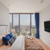 Luxury 2-bedroom condo at BEATNIQ Sukhumvit 32 for sale 21.5M THB. Cheapest unit in the building! High floor, smart home, near BTS. Great investment deal!