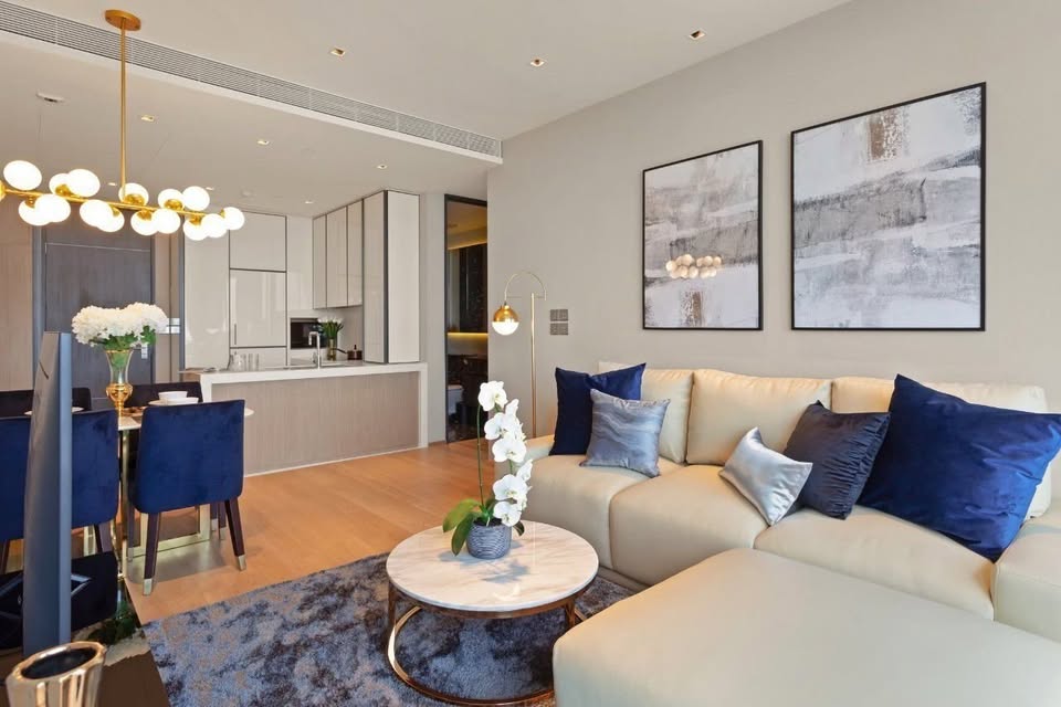 Luxury 2-bedroom condo at BEATNIQ Sukhumvit 32 for sale 21.5M THB. Cheapest unit in the building! High floor, smart home, near BTS. Great investment deal!