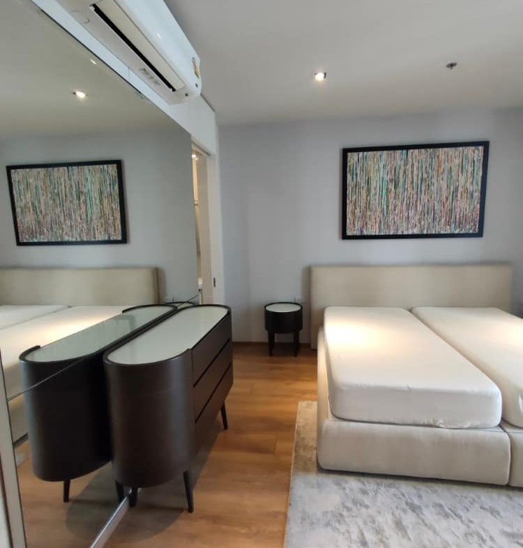 Luxury 2-bed, 2-bath condo at Park Origin Phrom Phong for rent. Fully renovated, 95 sqm, high floor, stunning views, premium amenities. Rent: 99,000 THB/month.
