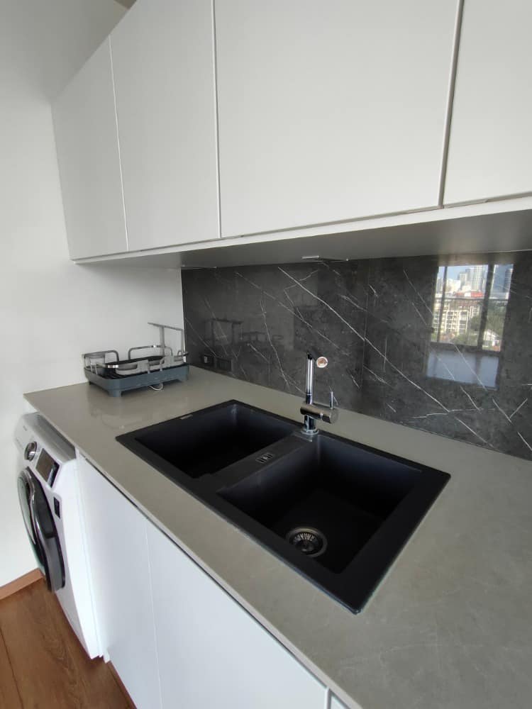 Luxury 2-bed, 2-bath condo at Park Origin Phrom Phong for rent. Fully renovated, 95 sqm, high floor, stunning views, premium amenities. Rent: 99,000 THB/month.
