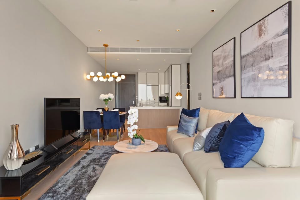 Luxury 2-bedroom condo at BEATNIQ Sukhumvit 32 for sale 21.5M THB. Cheapest unit in the building! High floor, smart home, near BTS. Great investment deal!