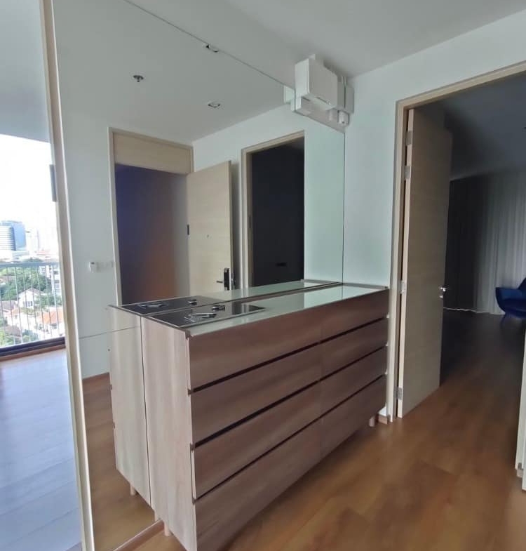 Luxury 2-bed, 2-bath condo at Park Origin Phrom Phong for rent. Fully renovated, 95 sqm, high floor, stunning views, premium amenities. Rent: 99,000 THB/month.