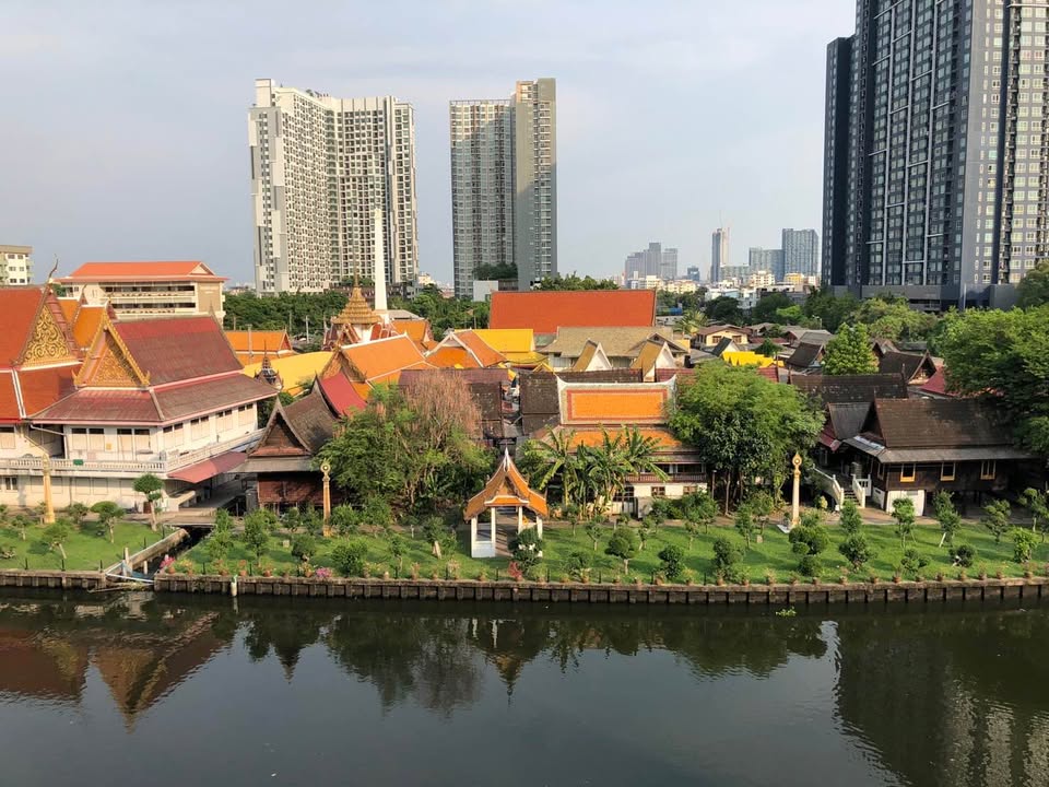 Modern 2-bedroom condo at Hasu Haus, 65 sqm, canal view, near BTS On Nut. Free shuttle service. High-end amenities. For rent at 40,000 THB/month.