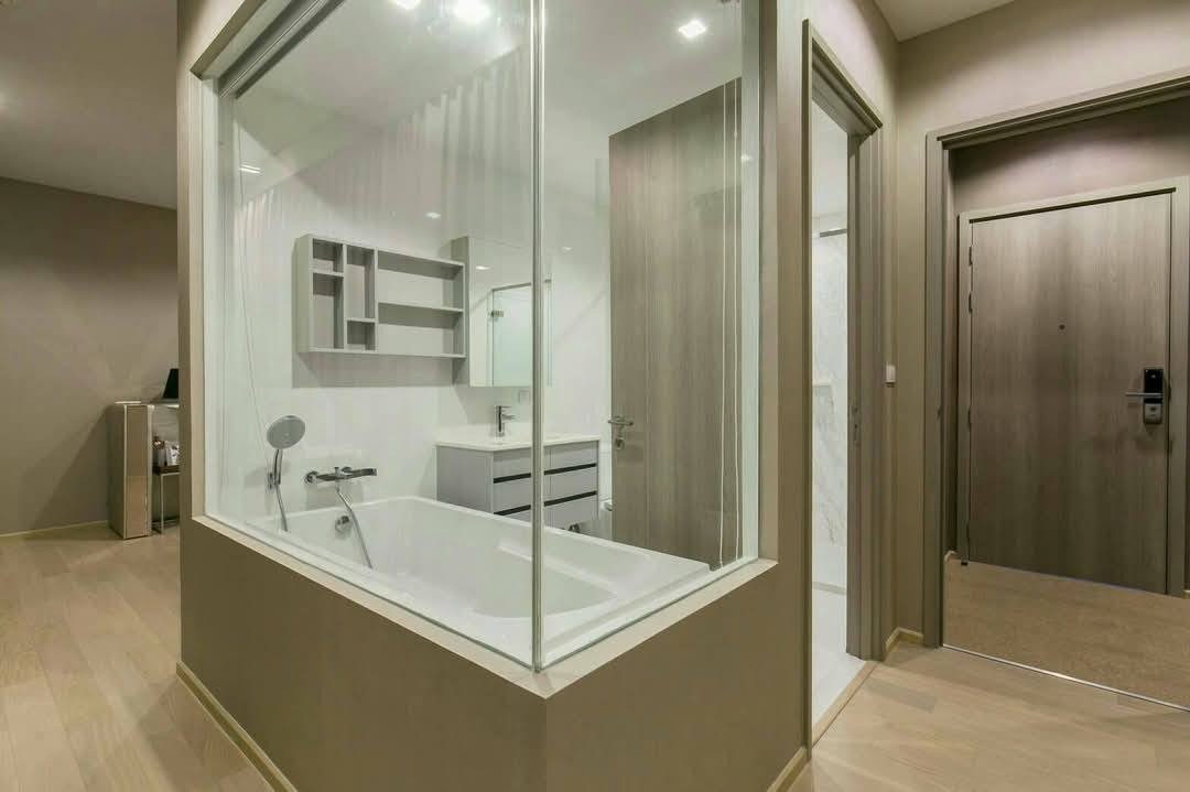 Luxury 1-bedroom, 2-bathroom duplex condo at HQ Thonglor for rent at 55,000 THB/month. High floor, fully furnished, top amenities, and near BTS Thong Lo.