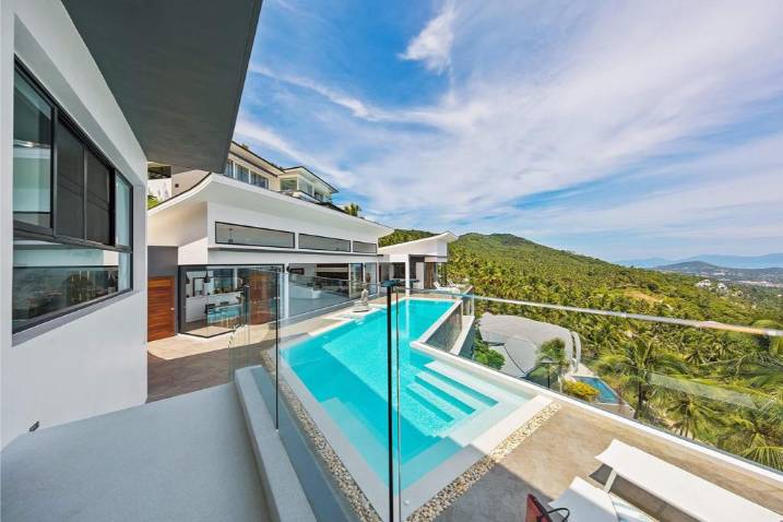 Luxury 4-bed 4.5-bath 882 SQM Villa Coco Koh Samui for sale. Private infinity pool, ocean views, top location in Chaweng Noi. Price 39.75M THB. Contact us now!