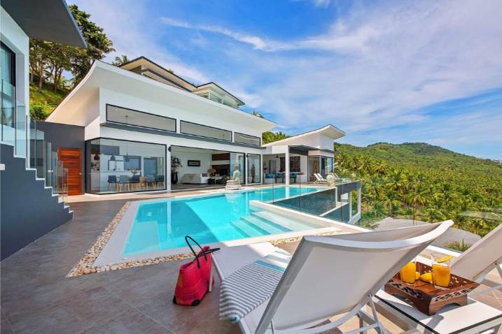 Luxury 4-bed 4.5-bath 882 SQM Villa Coco Koh Samui for sale. Private infinity pool, ocean views, top location in Chaweng Noi. Price 39.75M THB. Contact us now!