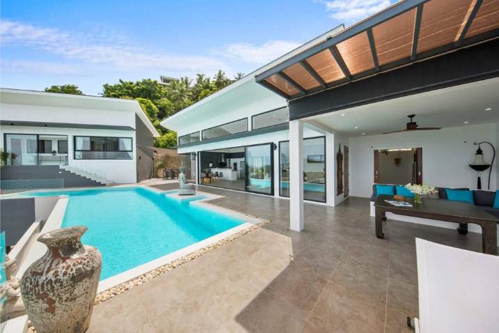 Luxury 4-bed 4.5-bath 882 SQM Villa Coco Koh Samui for sale. Private infinity pool, ocean views, top location in Chaweng Noi. Price 39.75M THB. Contact us now!
