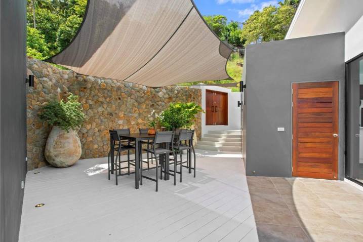 Luxury 4-bed 4.5-bath 882 SQM Villa Coco Koh Samui for sale. Private infinity pool, ocean views, top location in Chaweng Noi. Price 39.75M THB. Contact us now!