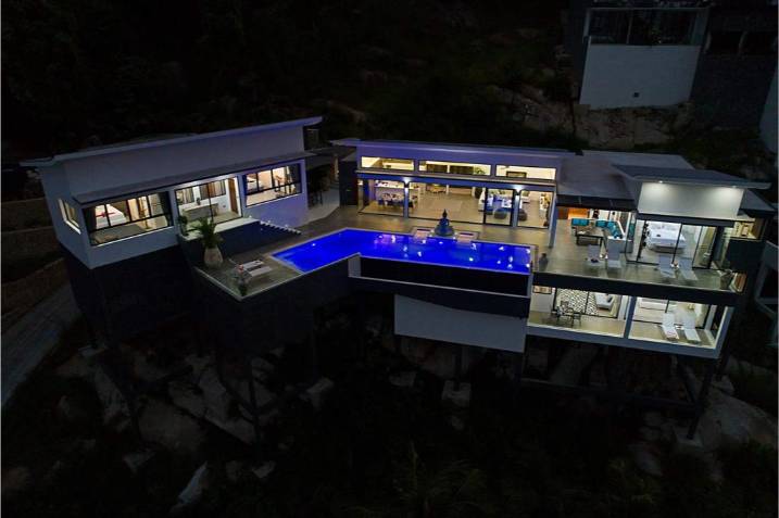 Luxury 4-bed 4.5-bath 882 SQM Villa Coco Koh Samui for sale. Private infinity pool, ocean views, top location in Chaweng Noi. Price 39.75M THB. Contact us now!