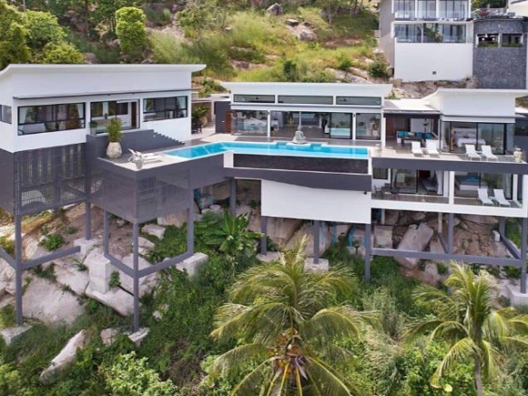 Luxury 4-bed 4.5-bath 882 SQM Villa Coco Koh Samui for sale. Private infinity pool, ocean views, top location in Chaweng Noi. Price 39.75M THB. Contact us now!