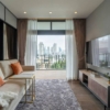 Luxury 2-bedroom condo at MUNIQ Sukhumvit 23, 86 sqm, 12th floor, prime Sukhumvit location. High-end facilities, near BTS Asoke. For rent at 100,000 THB/month.