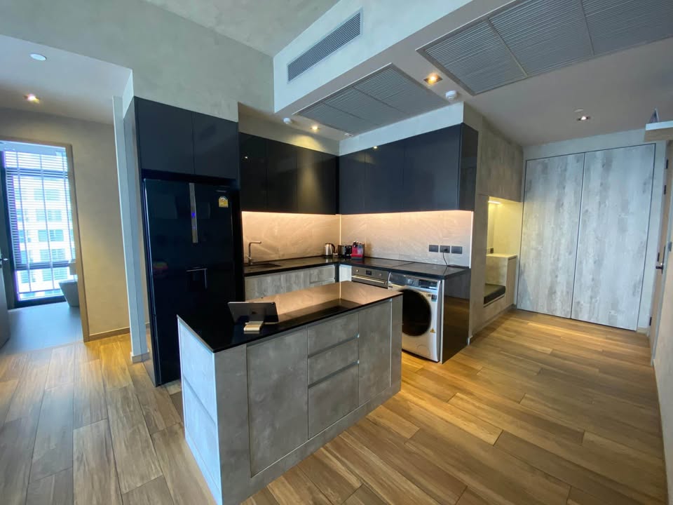 Modern 2BR 1BA condo at The Lofts Asoke, 75 sqm, high floor, fully furnished, prime Sukhumvit location, near MRT and BTS. Minimum 1-year lease.