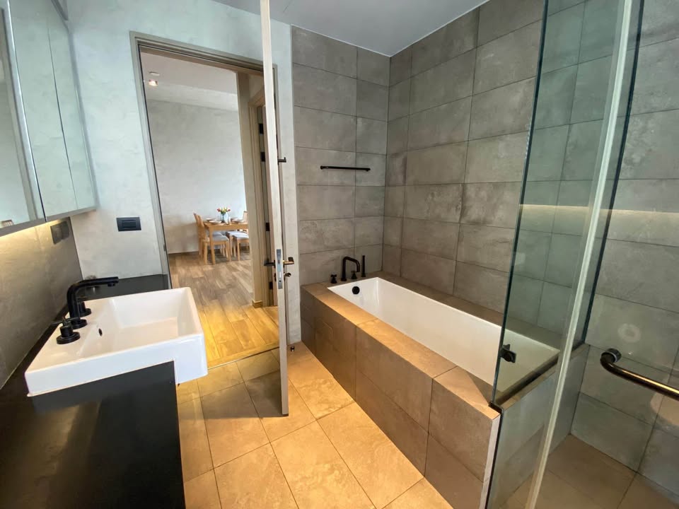 Modern 2BR 1BA condo at The Lofts Asoke, 75 sqm, high floor, fully furnished, prime Sukhumvit location, near MRT and BTS. Minimum 1-year lease.