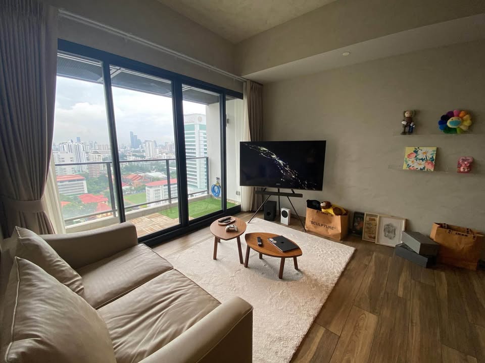 Modern 2BR 1BA condo at The Lofts Asoke, 75 sqm, high floor, fully furnished, prime Sukhumvit location, near MRT and BTS. Minimum 1-year lease.