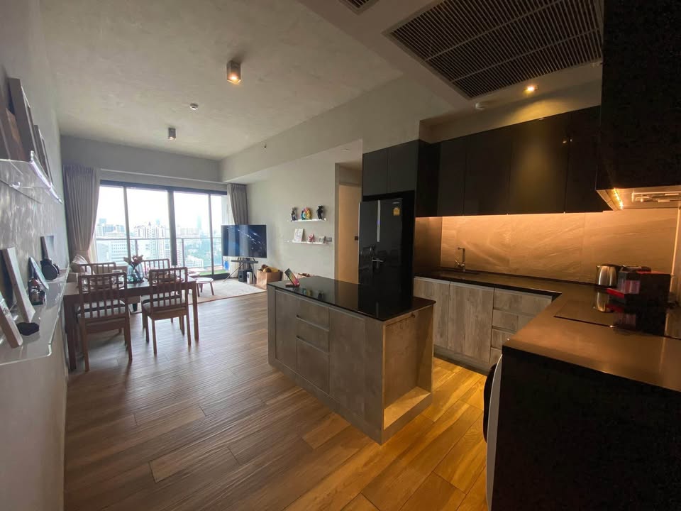 Modern 2BR 1BA condo at The Lofts Asoke, 75 sqm, high floor, fully furnished, prime Sukhumvit location, near MRT and BTS. Minimum 1-year lease.